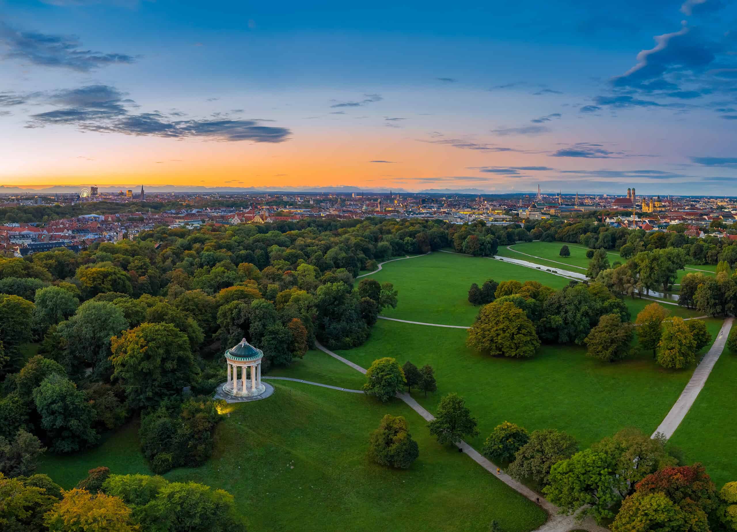 The beautiful morning mood in autumn by a flight over the English Garden of Munich, Bavaria. The beautiful morning mood in autumn by a flight over the English Garden of Munich, Bavaria.